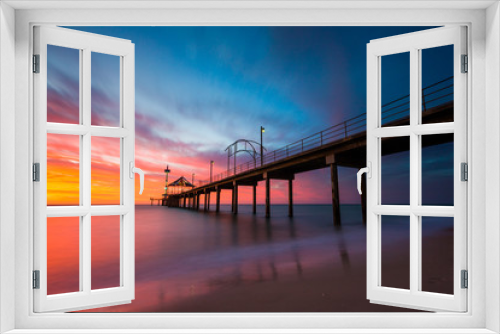 Fototapeta Naklejka Na Ścianę Okno 3D - A vibrant sunset at Brighton Jetty in Brighton, Adelaide, South Australia, Australia on 1st February 2018
