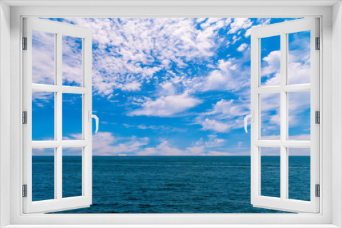 Fototapeta Naklejka Na Ścianę Okno 3D - Blue sky, white clouds and the sea