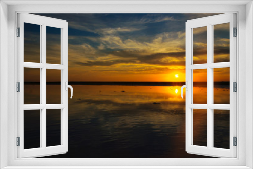 Fototapeta Naklejka Na Ścianę Okno 3D - beautiful sunset over the sea, bright sunset colors in the clouds in the sky, beautiful background, desktop Wallpapers