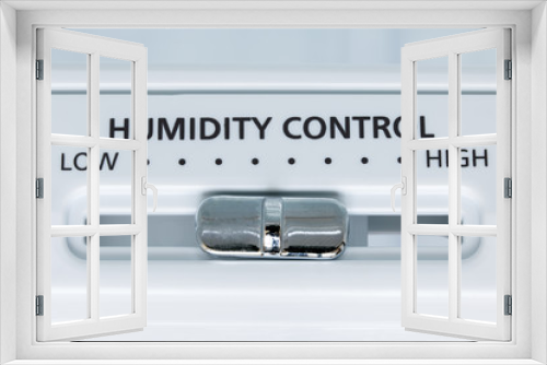 A control of humidity in the fridge, close-up view. Select the degree of humidity in the cooling device.