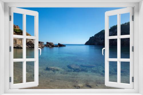 Fototapeta Naklejka Na Ścianę Okno 3D - The cove will be with blue water on the island of Ibiza