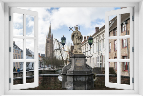 Fototapeta Naklejka Na Ścianę Okno 3D - St. John of Nepomuk statue on bridge, Brugge, Belgium