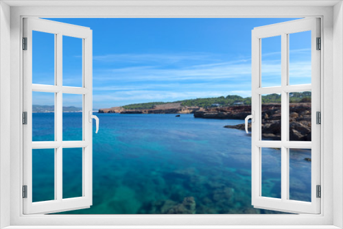 Fototapeta Naklejka Na Ścianę Okno 3D - The coast on a blue day in Ibiza