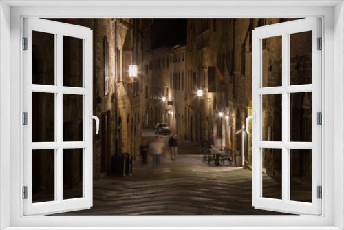Fototapeta Naklejka Na Ścianę Okno 3D - Medieval streets of San Gimignano at night, Tuscany, Italy