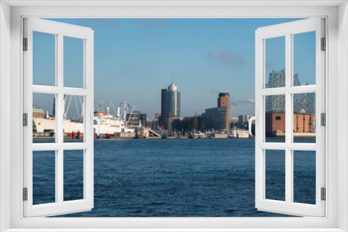 Hamburg, Germany. River station of the city against the backdrop of the river Elbe and port cargo grains