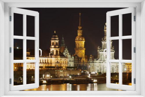 Fototapeta Naklejka Na Ścianę Okno 3D - Night view of the city with royal palace buildings and reflections in the Elbe river in Dresden, Germany.