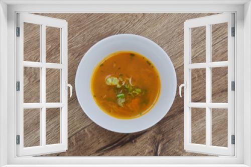 Fototapeta Naklejka Na Ścianę Okno 3D - Chickpeas soup with vegetable on a wooden table