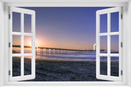 Fototapeta Naklejka Na Ścianę Okno 3D - The sunset over the Ocean Beach Pier near San Diego, California.