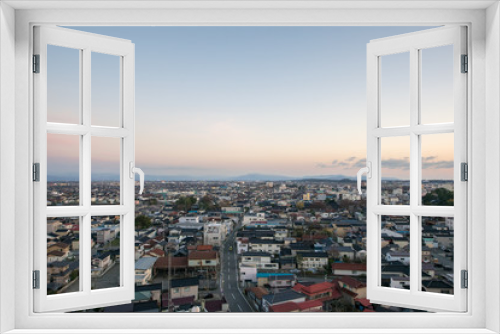 Fototapeta Naklejka Na Ścianę Okno 3D - 酒田市街から見る夕暮れの鳥海山（庄内平野）