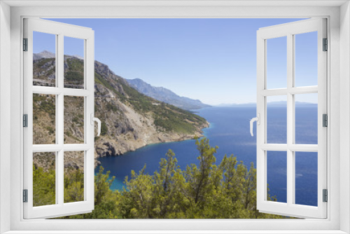 Fototapeta Naklejka Na Ścianę Okno 3D - Dalmatian coastline with its cliff and streets through mountains, by the sea