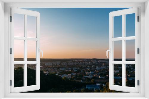 Fototapeta Naklejka Na Ścianę Okno 3D - Sunset landscape over the city