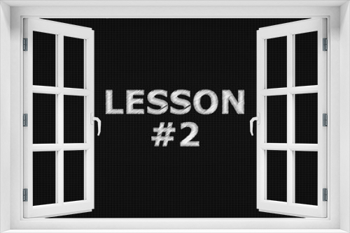 Lesson #2 word on grey background.