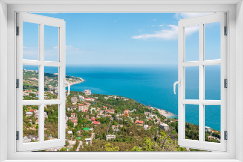 Fototapeta Naklejka Na Ścianę Okno 3D - Beach at the seaside, blue water, view from above the mountains to the town of Simeiz, Yalta, Crimea
