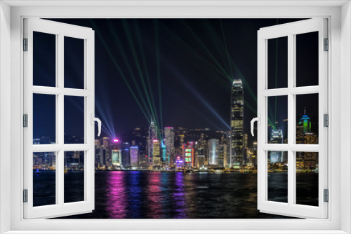 Fototapeta Naklejka Na Ścianę Okno 3D - Hong Kong Central Business District at night with laser beam