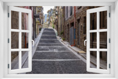 Fototapeta Naklejka Na Ścianę Okno 3D - Narrow street of Lascari in Sicily, Italy