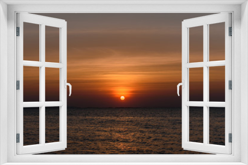 Fototapeta Naklejka Na Ścianę Okno 3D - Sunset sky on the sea in the evening