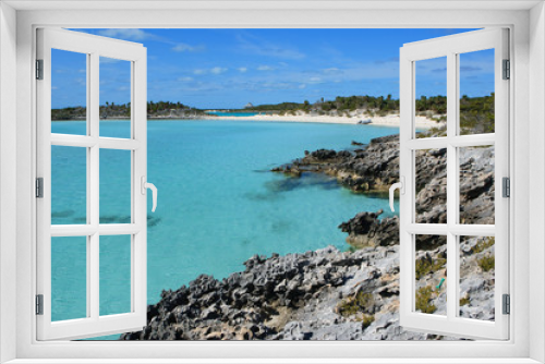 Fototapeta Naklejka Na Ścianę Okno 3D - A small picturesque beach called Butterfly Beach located on Warderick Wells. The island is a part of the Exuma Land and Sea Park and is a protected National Park.