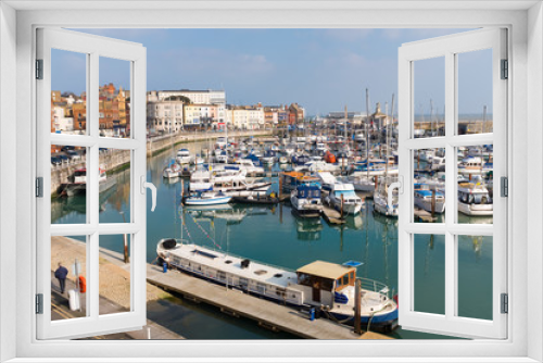 Fototapeta Naklejka Na Ścianę Okno 3D - The marina of the Royal Harbour of Ramsgate, Kent, UK. The town has one of the largest marinas on the English  south coast. It  was given its royal status by King George IV