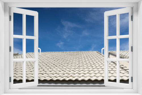 Fototapeta Naklejka Na Ścianę Okno 3D - white roof house on blue sky and cloud