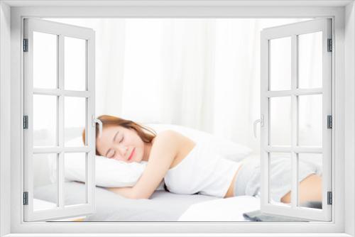 Beautiful asian young woman sleeping lying in bed with head on pillow comfortable and happy. girl with relax for health concept.