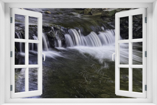 Fototapeta Naklejka Na Ścianę Okno 3D - River water with rocks and waterfalls