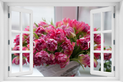 Fototapeta Naklejka Na Ścianę Okno 3D - Bouquet of Pion-shaped tulips on a light background. Holiday card.