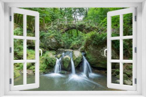 Fototapeta Naklejka Na Ścianę Okno 3D - Amazing paradise waterfall in colorful european forest with stone bridge crossing