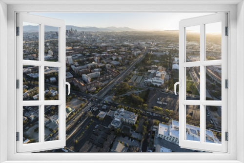 Fototapeta Naklejka Na Ścianę Okno 3D - Aerial view of Exposition Park, University of Southern California campus, and neighborhoods south of downtown Los Angeles in Southern California.