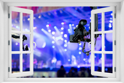 Fototapeta Naklejka Na Ścianę Okno 3D - video camera on crane  covering event on stage