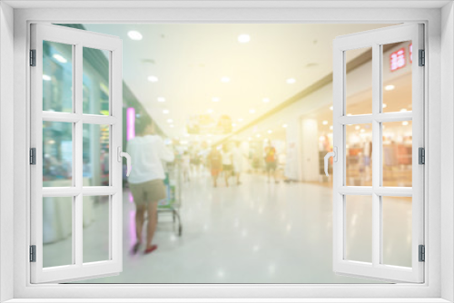 Fototapeta Naklejka Na Ścianę Okno 3D - Blurred defocused background of generic supermarket people walking shopping.