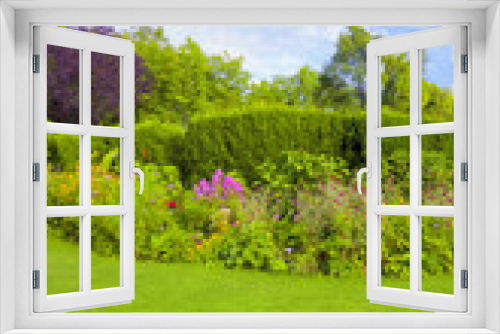 Fototapeta Naklejka Na Ścianę Okno 3D - Schönes Blumenbeet