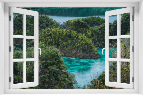 Fototapeta Naklejka Na Ścianę Okno 3D - Peanemo Islands with blue lagoon between. Untouched nature. Raja Ampat, West Papua, Indonesia