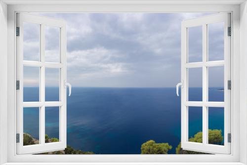 Fototapeta Naklejka Na Ścianę Okno 3D - Gorgeous scenery by the sea under a cloudy sky in Sithonia, Chalkidiki, Greece 
