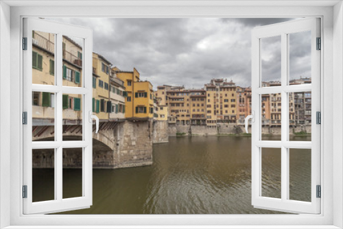 Fototapeta Naklejka Na Ścianę Okno 3D - Iconic monument, bridge, Ponte Vecchio, medieval stone construction over Arno river. Tuscany, Italy.