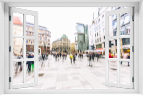 Fototapeta Naklejka Na Ścianę Okno 3D - Silhouette of people on city street