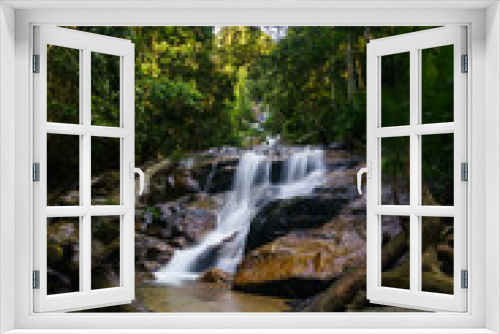Fototapeta Naklejka Na Ścianę Okno 3D - scenery of tropical forest waterfall