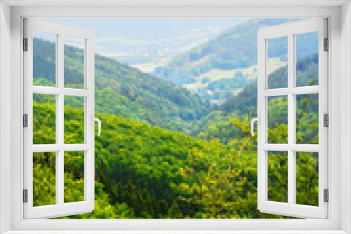 Fototapeta Naklejka Na Ścianę Okno 3D - Hills and misty valley in the Stone Mountains (Gory Kamienne). Vast panorama of picturesque countryside landscape in Sudetes, Poland. Aerial view.