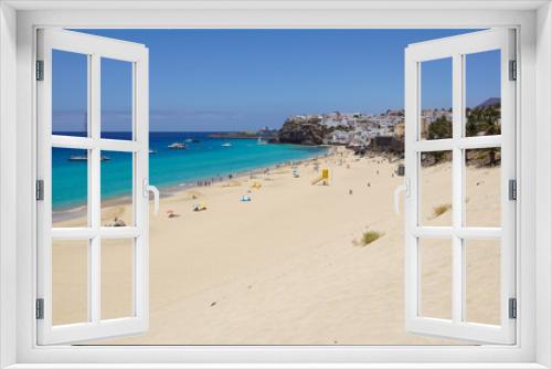 Fototapeta Naklejka Na Ścianę Okno 3D - Sand dune and coastal promenade along a beach in Morro Jable town, Fuerteventura, Canary Islands, Spain