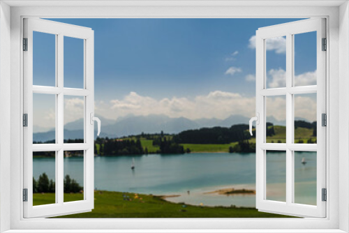 Fototapeta Naklejka Na Ścianę Okno 3D - Panoramic view over lake forggensee near fuessen in bayern germany