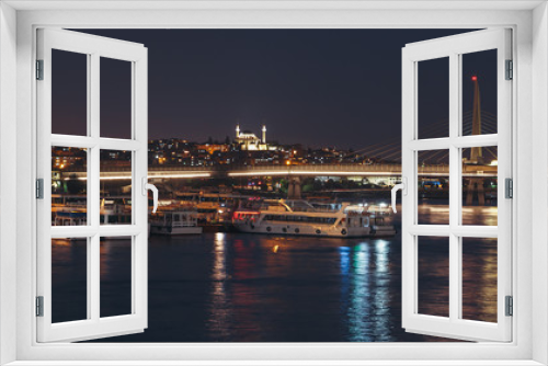 Fototapeta Naklejka Na Ścianę Okno 3D - Night view of Unkapani Ataturk subway bridge on the Golden Horn in Istanbul, Turkey.