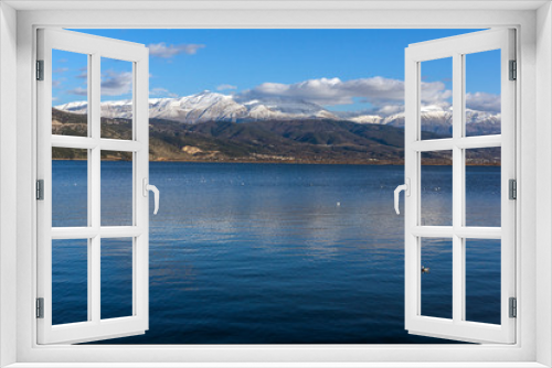 Fototapeta Naklejka Na Ścianę Okno 3D - Amazing panoramic Landscape of Lake Pamvotida and Pindus mountain from city of Ioannina, Epirus, Greece