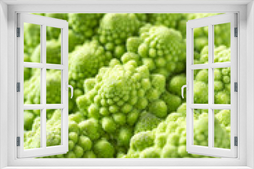 Fototapeta Naklejka Na Ścianę Okno 3D - Closeup of romanesco broccoli or Roman cauliflower on wooden table