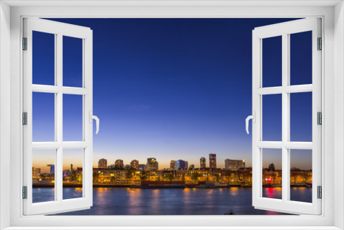 Travel Concepts and Ideas. Beautiful and Astonishing View of Rotterdam Skyline at Blue Hour Time.