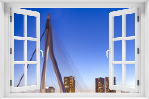 Fototapeta Naklejka Na Ścianę Okno 3D - Travel Concepts. View of Unique and Beautiful Erasmus Bridge in Rotterdam. Shot During Blue Hour