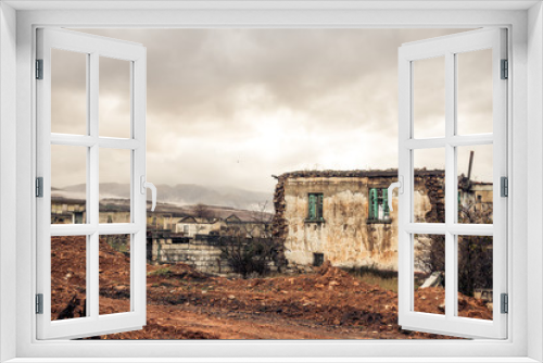 Fototapeta Naklejka Na Ścianę Okno 3D - an abandoned town in Ptolemaida greece