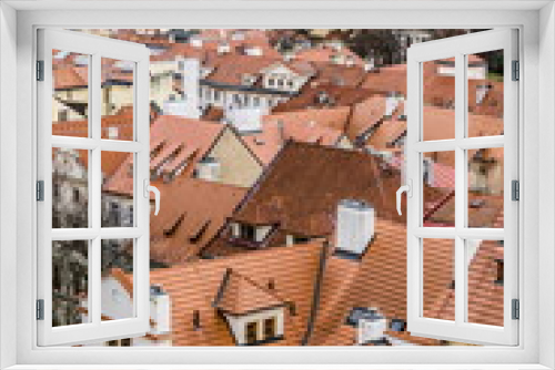Fototapeta Naklejka Na Ścianę Okno 3D - Tiled roofs of Prague's houses