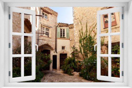 Fototapeta Naklejka Na Ścianę Okno 3D - facades of ancient stone buildings at old european town, Antibes, France