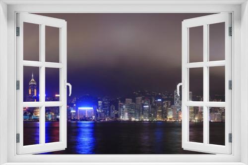 Fototapeta Naklejka Na Ścianę Okno 3D - Panorama of the skyline of Hong Kong at night, with mist