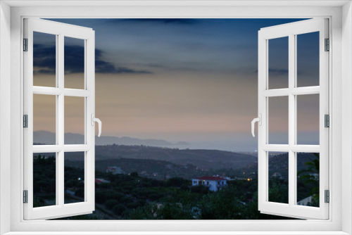 Bush plantation and town, Crete, Greece