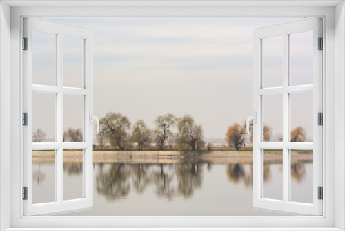 Fototapeta Naklejka Na Ścianę Okno 3D - A Cloudy Day with Beautiful Tree Reflections